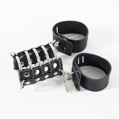 Black leather chastity cage with two matching leather rings