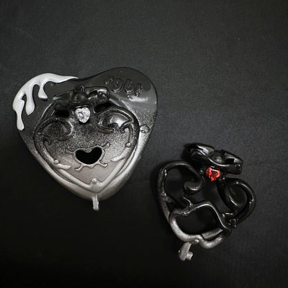 Actual Black Spade resin product photograph showing textured dark finish and clear and red gem accents