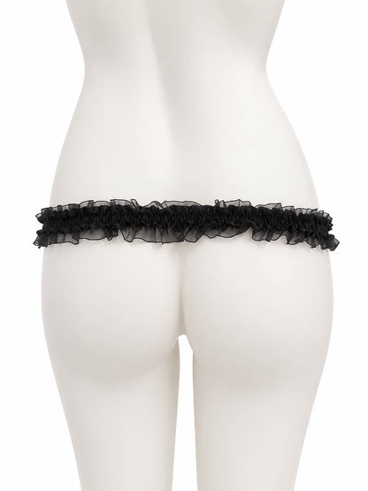 Black lace support strap shown from the rear on a display mannequin