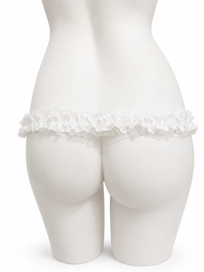 White lace support strap shown from the rear on a display mannequin
