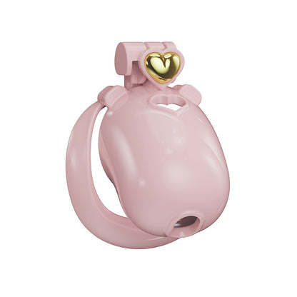 Solid pink heart resin chastity cage from an angle