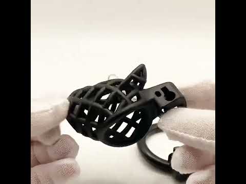 Black Dog Head Plastic Chastity Cage product video showing cage, base ring and brass lock