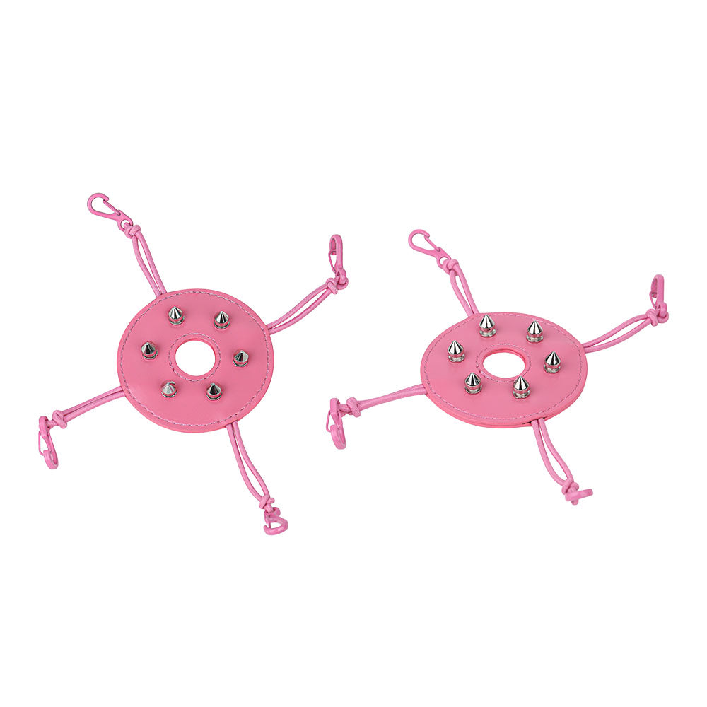 Pair of pink riveted covers with four elastic fastening cords