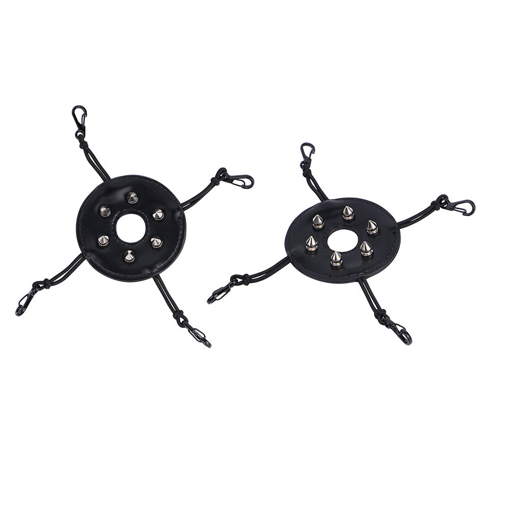 Pair of black riveted covers with four elastic fastening cords