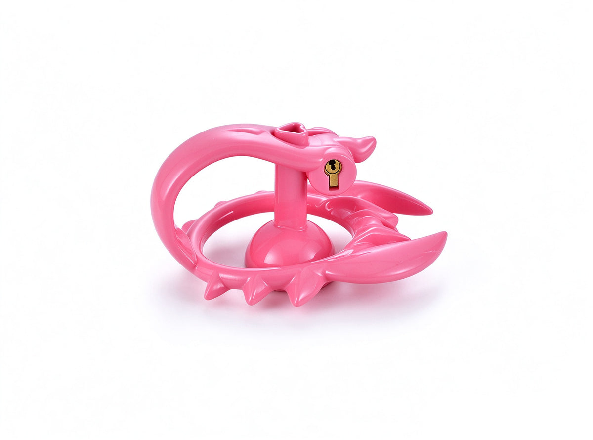 Pink scorpion chastity cage side view